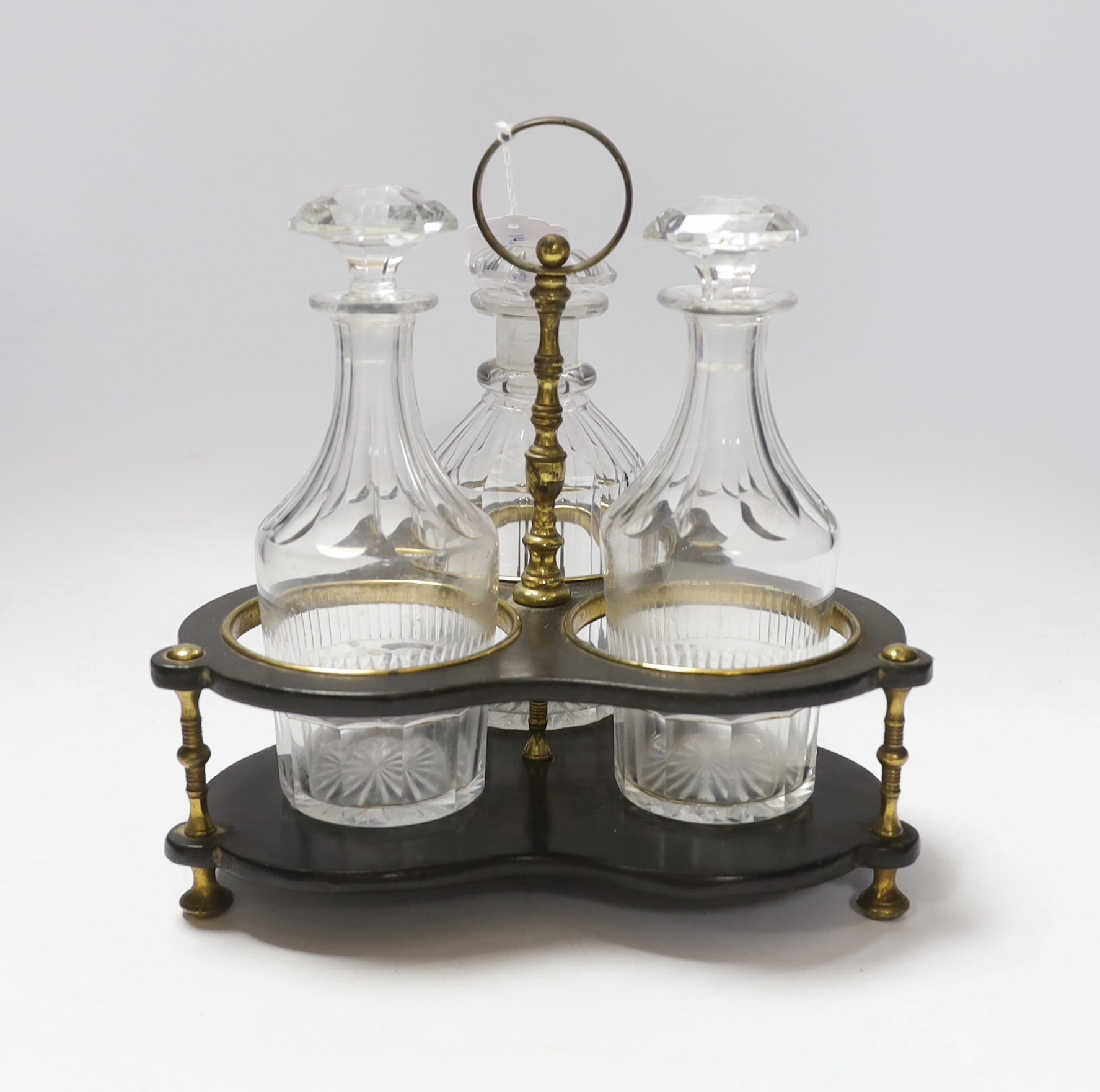 A Regency decanter stand holding three associated cut glass decanters, 24cm